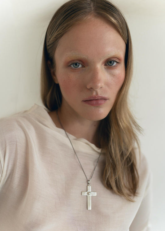 Silver cross with natural pearl